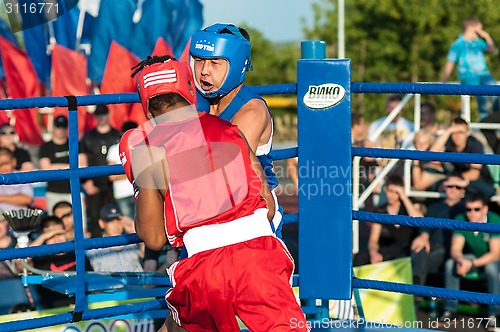 Image of A boxing match Javier Ibanez, Cuba and Malik Bajtleuov, Russia. Defeated Javier Ibanez