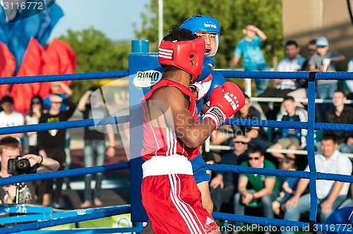 Image of A boxing match Javier Ibanez, Cuba and Malik Bajtleuov, Russia. Defeated Javier Ibanez