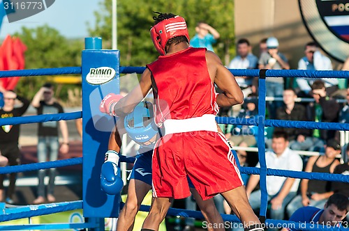 Image of A boxing match Javier Ibanez, Cuba and Malik Bajtleuov, Russia. Defeated Javier Ibanez