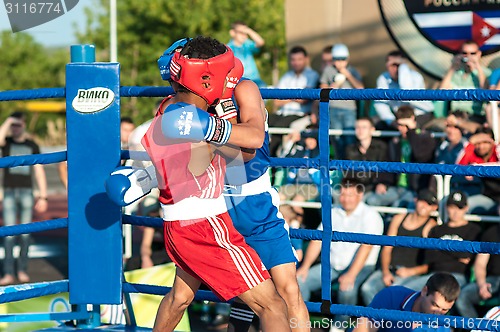 Image of A boxing match Javier Ibanez, Cuba and Malik Bajtleuov, Russia. Defeated Javier Ibanez