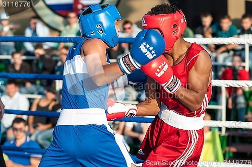 Image of A boxing match Javier Ibanez, Cuba and Malik Bajtleuov, Russia. Defeated Javier Ibanez