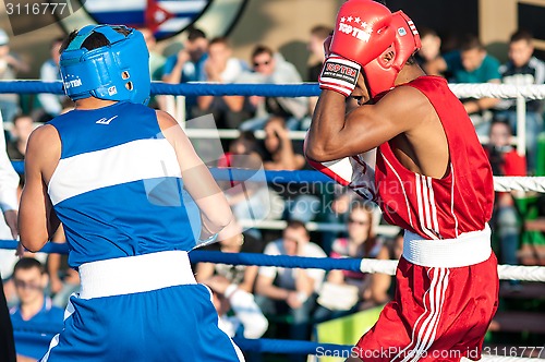 Image of A boxing match Javier Ibanez, Cuba and Malik Bajtleuov, Russia. Defeated Javier Ibanez