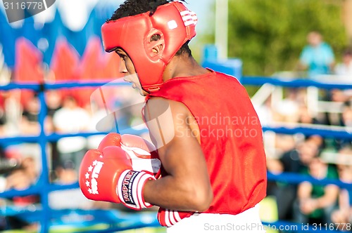 Image of A boxing match Javier Ibanez, Cuba and Malik Bajtleuov, Russia. Defeated Javier Ibanez