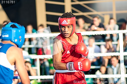 Image of A boxing match Javier Ibanez, Cuba and Malik Bajtleuov, Russia. Defeated Javier Ibanez