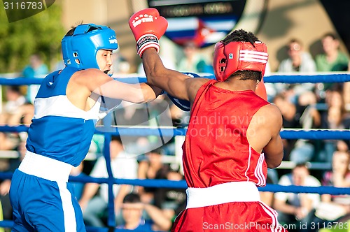 Image of A boxing match Javier Ibanez, Cuba and Malik Bajtleuov, Russia. Defeated Javier Ibanez