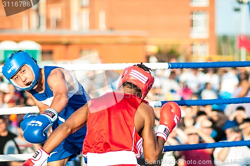 Image of A boxing match Javier Ibanez, Cuba and Malik Bajtleuov, Russia. Defeated Javier Ibanez