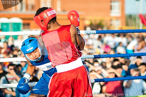 Image of A boxing match Javier Ibanez, Cuba and Malik Bajtleuov, Russia. Defeated Javier Ibanez