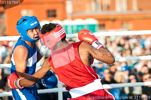 Image of A boxing match Javier Ibanez, Cuba and Malik Bajtleuov, Russia. Defeated Javier Ibanez