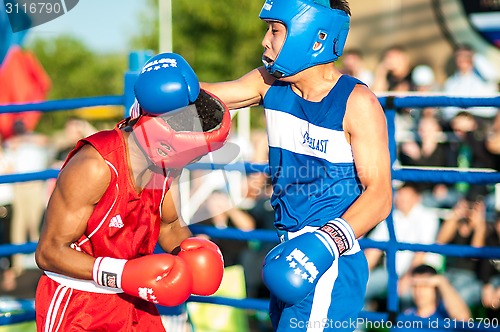 Image of A boxing match Javier Ibanez, Cuba and Malik Bajtleuov, Russia. Defeated Javier Ibanez