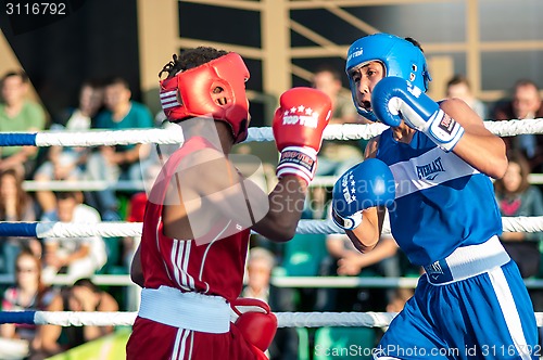 Image of A boxing match Javier Ibanez, Cuba and Malik Bajtleuov, Russia. Defeated Javier Ibanez