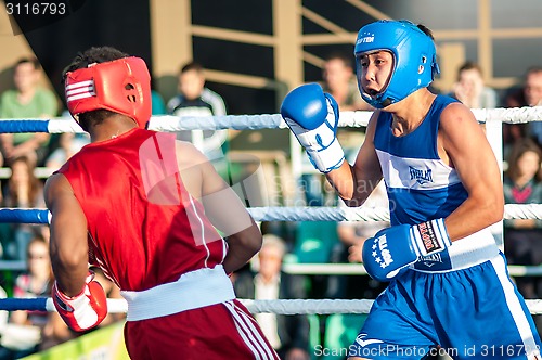 Image of A boxing match Javier Ibanez, Cuba and Malik Bajtleuov, Russia. Defeated Javier Ibanez