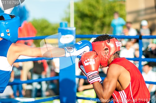 Image of A boxing match Javier Ibanez, Cuba and Malik Bajtleuov, Russia. Defeated Javier Ibanez