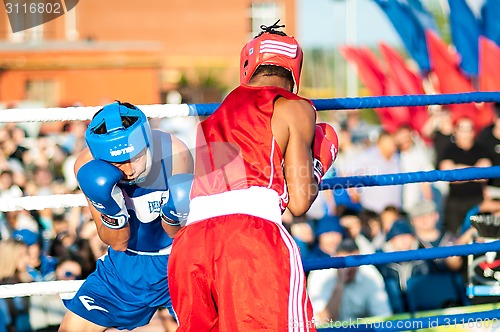 Image of A boxing match Javier Ibanez, Cuba and Malik Bajtleuov, Russia. Defeated Javier Ibanez