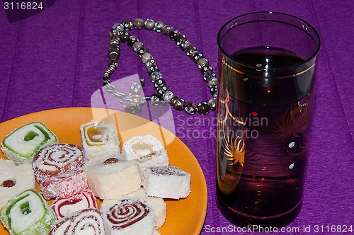 Image of Turkish delight and a glass of refreshing drink