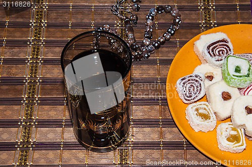 Image of Turkish delight and a glass of refreshing drink