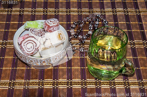 Image of Turkish delight and a glass of refreshing drink