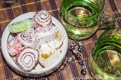 Image of Turkish delight and a glass of refreshing drink