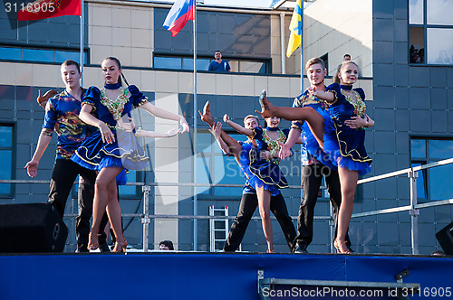 Image of Young people perform folk dance