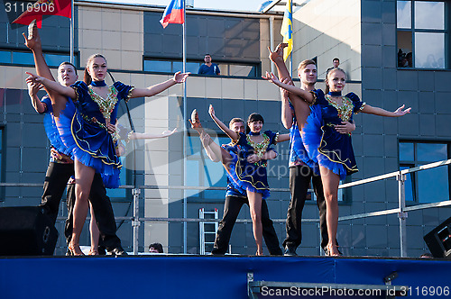 Image of Young people perform folk dance