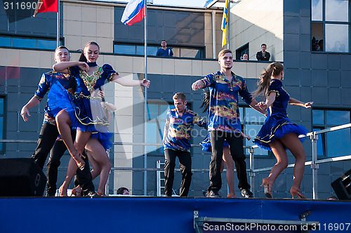 Image of Young people perform folk dance