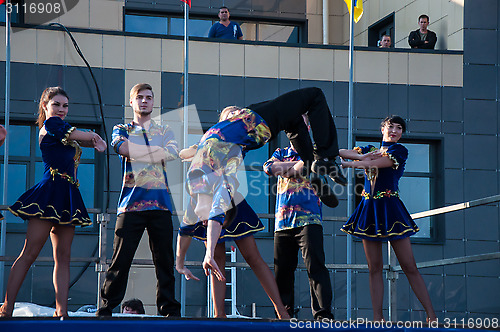 Image of Young people perform folk dance