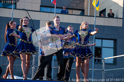 Image of Young people perform folk dance