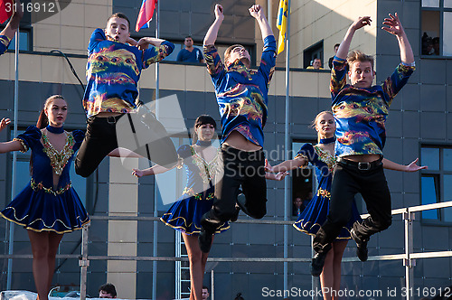 Image of Young people perform folk dance