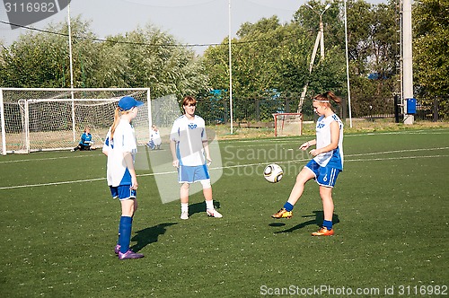 Image of The girls play soccer