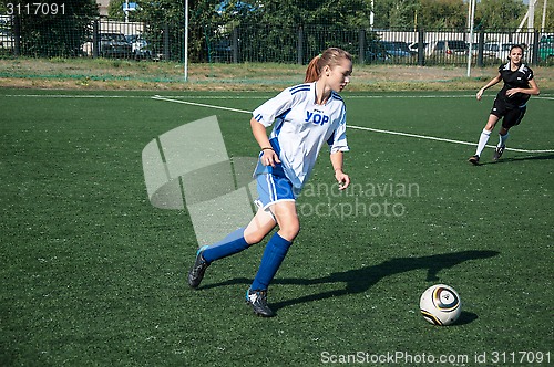 Image of The girls play soccer