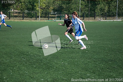 Image of The girls play soccer