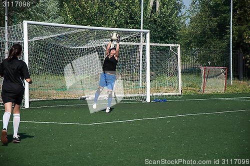 Image of The girls play soccer