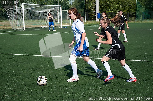 Image of The girls play soccer