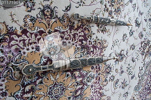 Image of Dagger Damascus Steel on the carpet