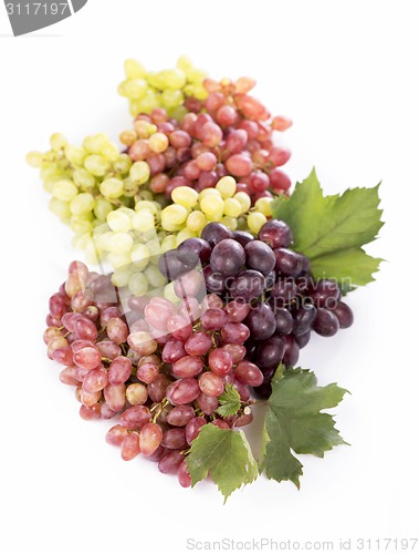 Image of Grape cluster with leaves isolated
