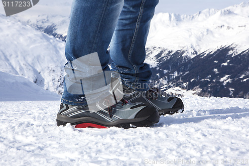 Image of Safety shoes in the snowy mountains