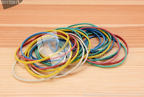 Image of Large pile of coloured rubber bands