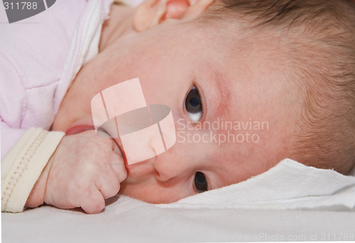 Image of Baby sucking her thumb