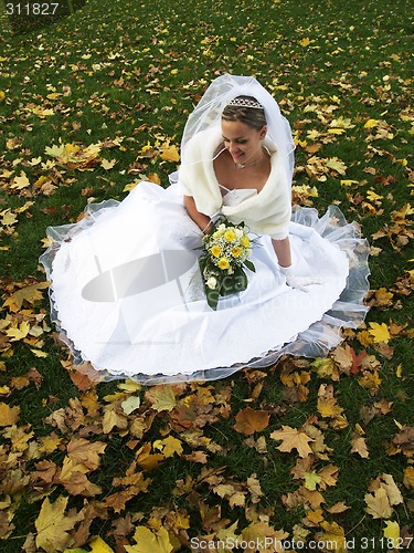 Image of Bride in Yelow Leaves