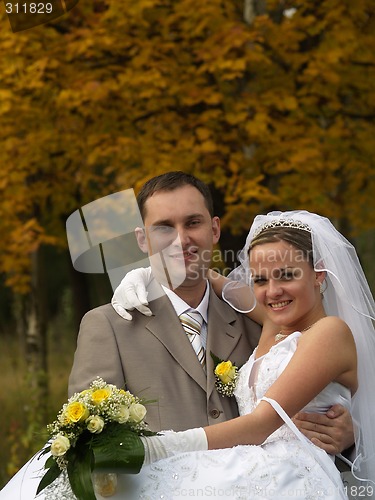 Image of Just Married Portrait in Yellow Trees