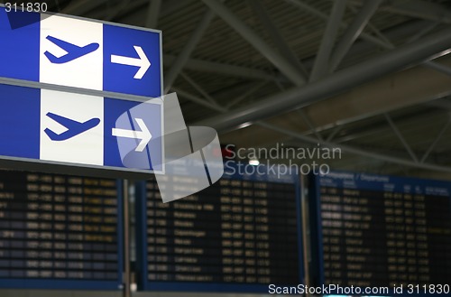 Image of Airport flight information boards