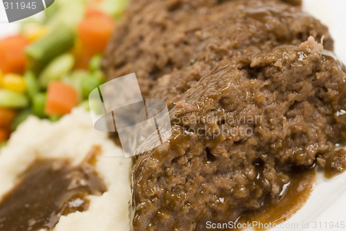 Image of meatloaf with mashed potatoes and vegetables