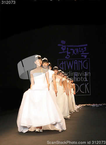 Image of Wedding dress models walking the catwalk at Seoul Collection (Fa