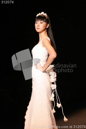 Image of Wedding dress model walking the catwalk at Seoul Collection (Fas