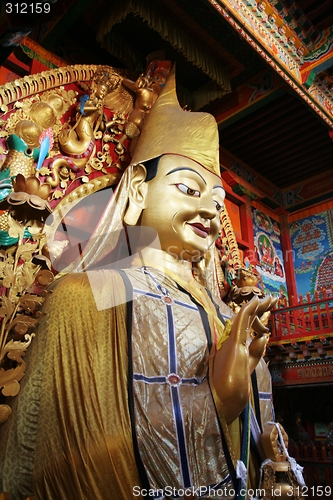 Image of Buddhist statue in a Tibetan temple in China