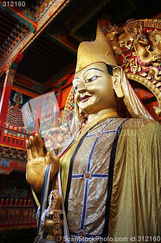 Image of Buddhist statue in a Tibetan temple in China