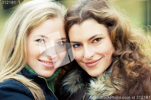 Image of two young women in the park