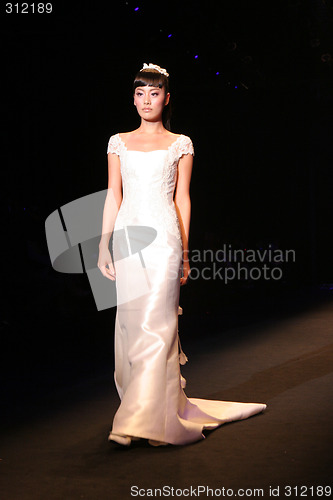 Image of Wedding dress model walking the catwalk at Seoul Collection (Fas
