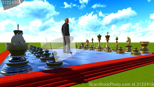 Image of Businessman on chess board