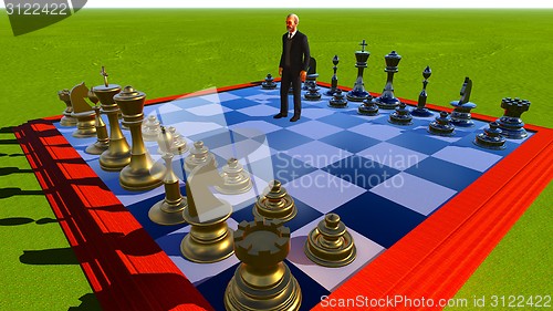 Image of Businessman on chess board