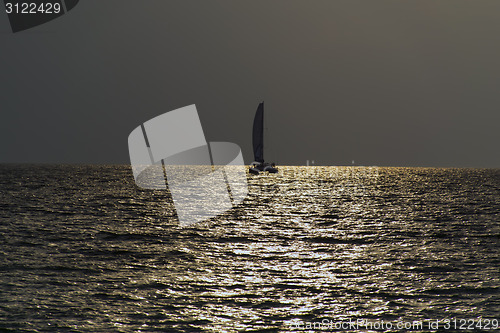 Image of Catamaran at Sunset.